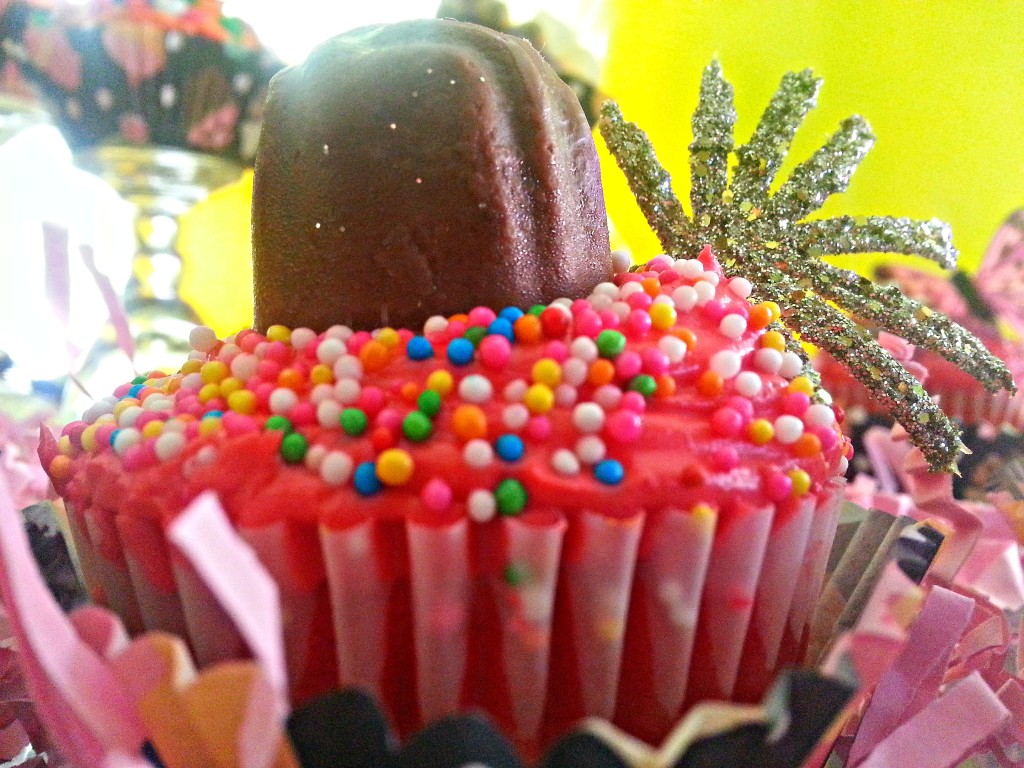 Bright rainbow colour cupcakes